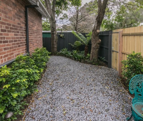 Back Garden of Elster Gardens BnB with entrance to Elster Creek and bike Trails